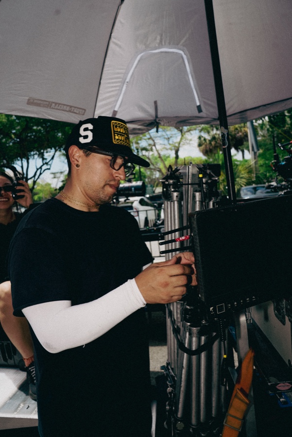 A crew member on headset between setups